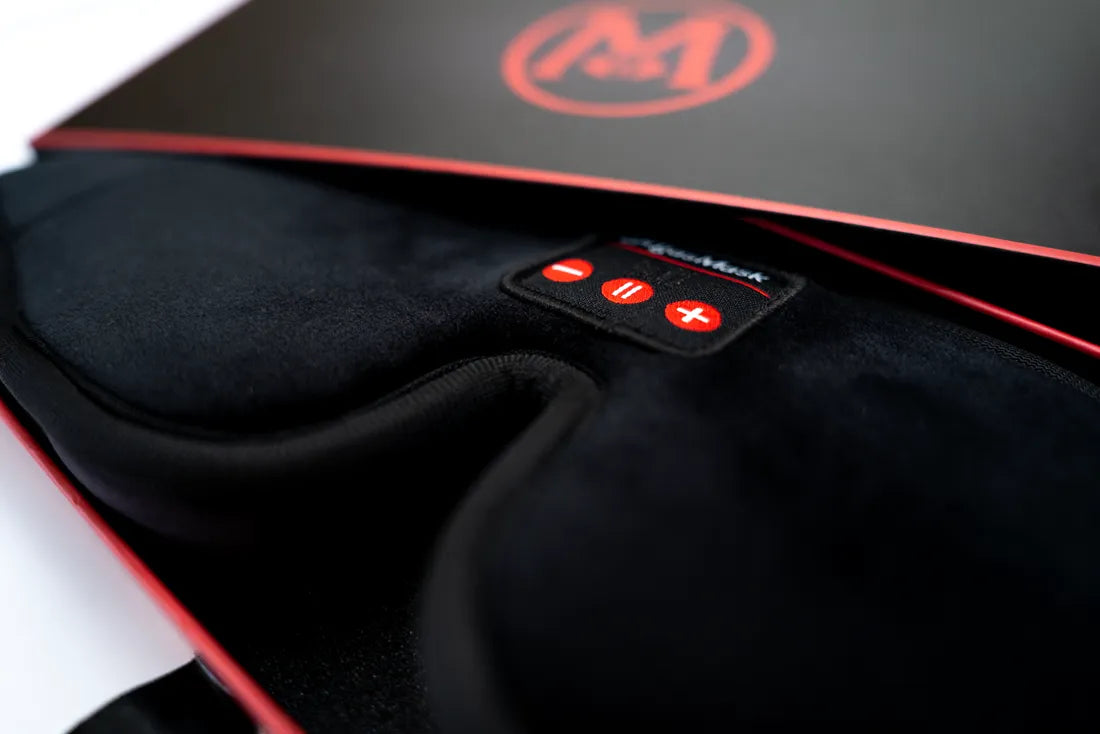 Macro shot of the mask's control pad and padded interior inside the box